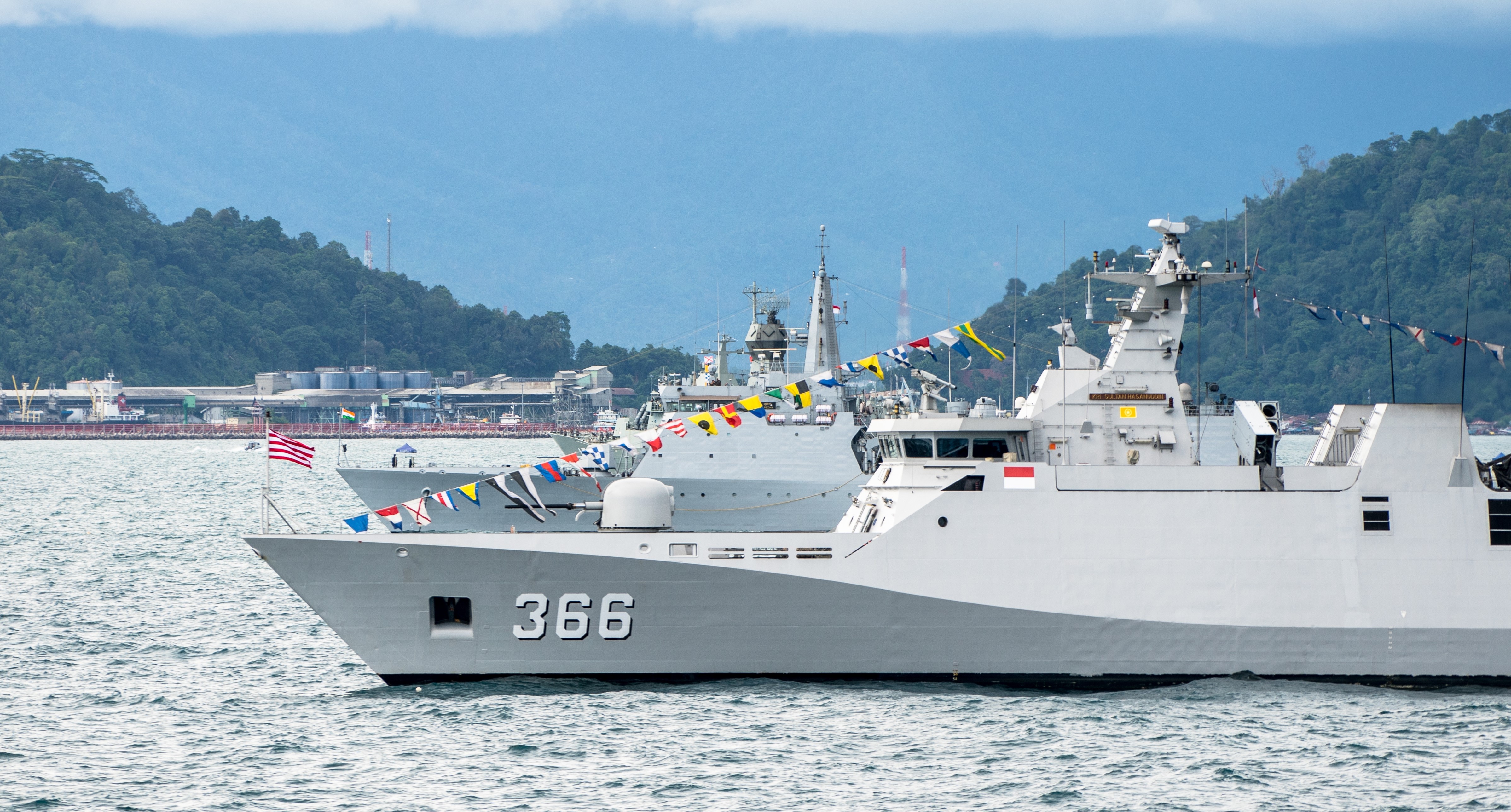 PADANG, INDONESIA - APRIL 11, 2016 : KRI Sultan Hasanuddin (366), Sigma class corvette of Indonesian Navy anchors among the other navies participating in Multilateral Naval Exercise Komodo 2016.