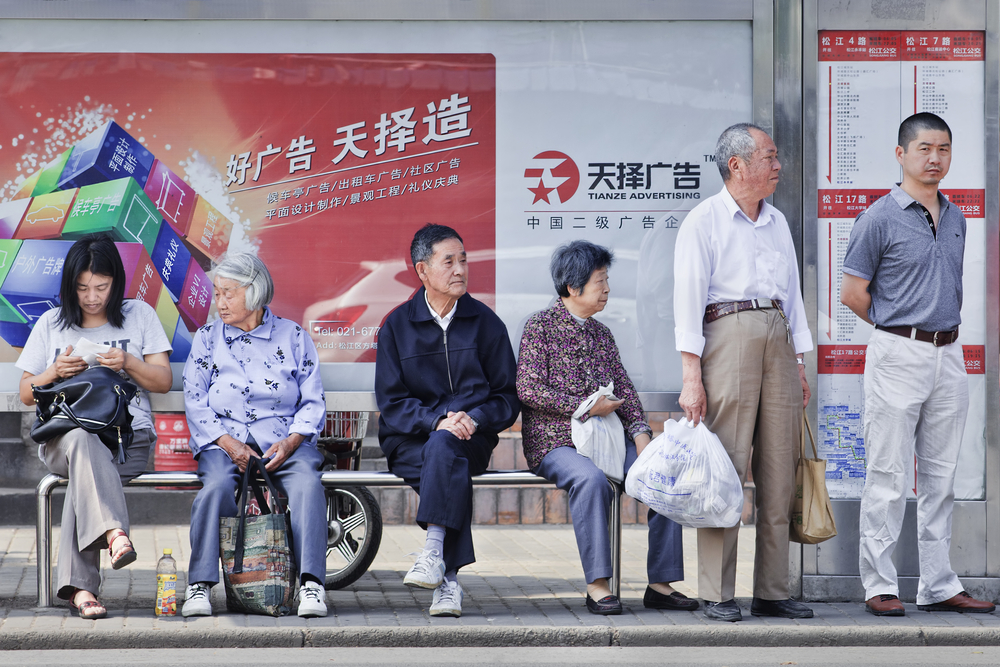 SHANGHAI-JUNE 3. Chinese elderly at bus stop