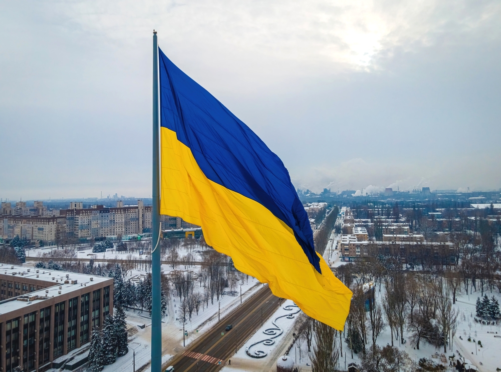 The aerial view of the Ukraine flag in winter